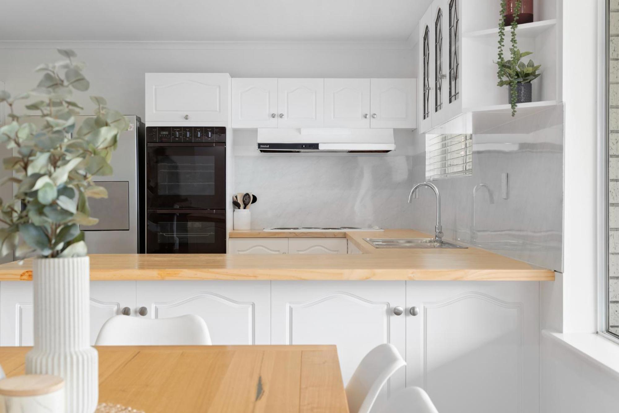 The Arches ~ Style, location and spacious living!