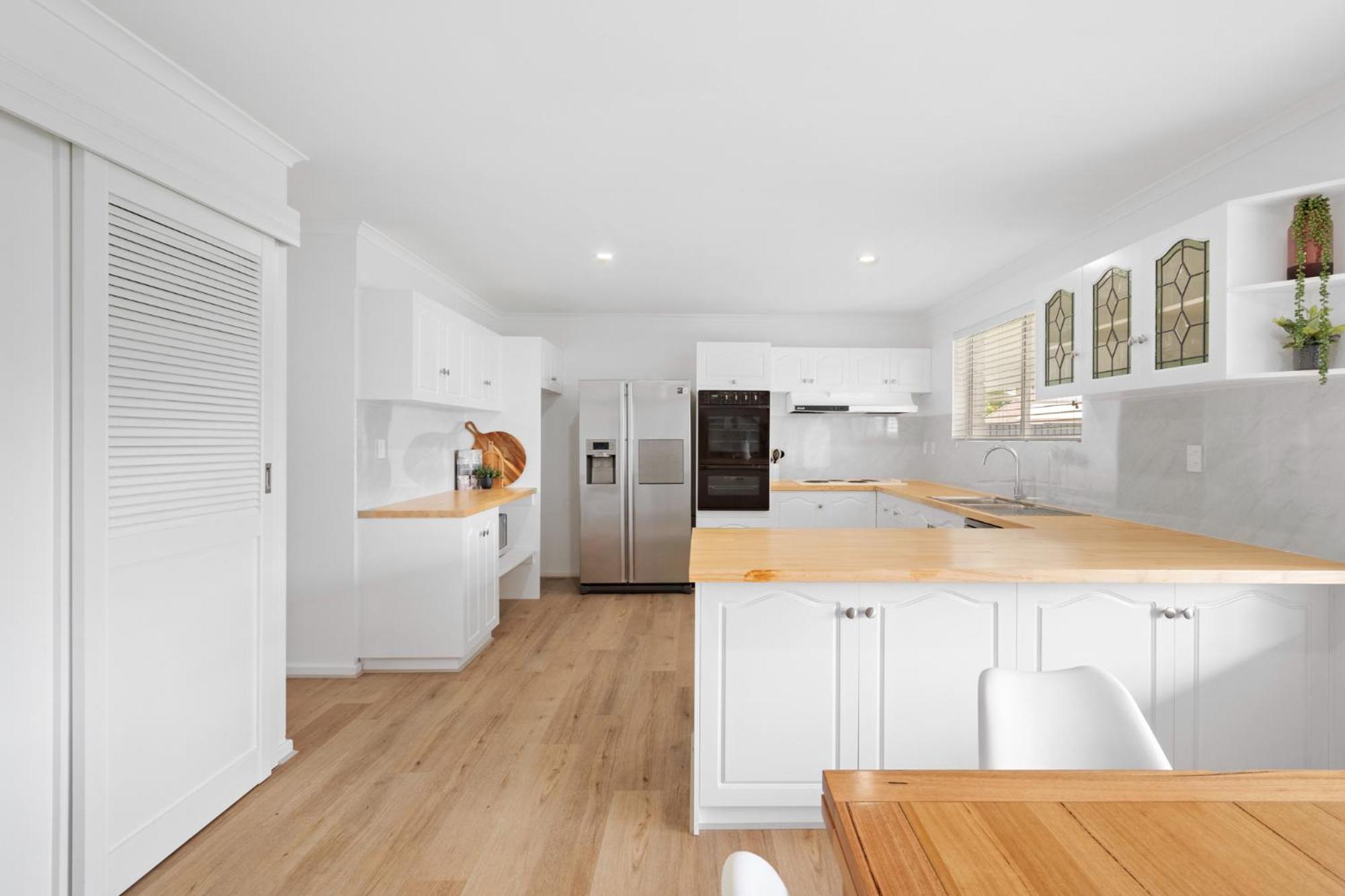 The Arches ~ Style, location and spacious living!
