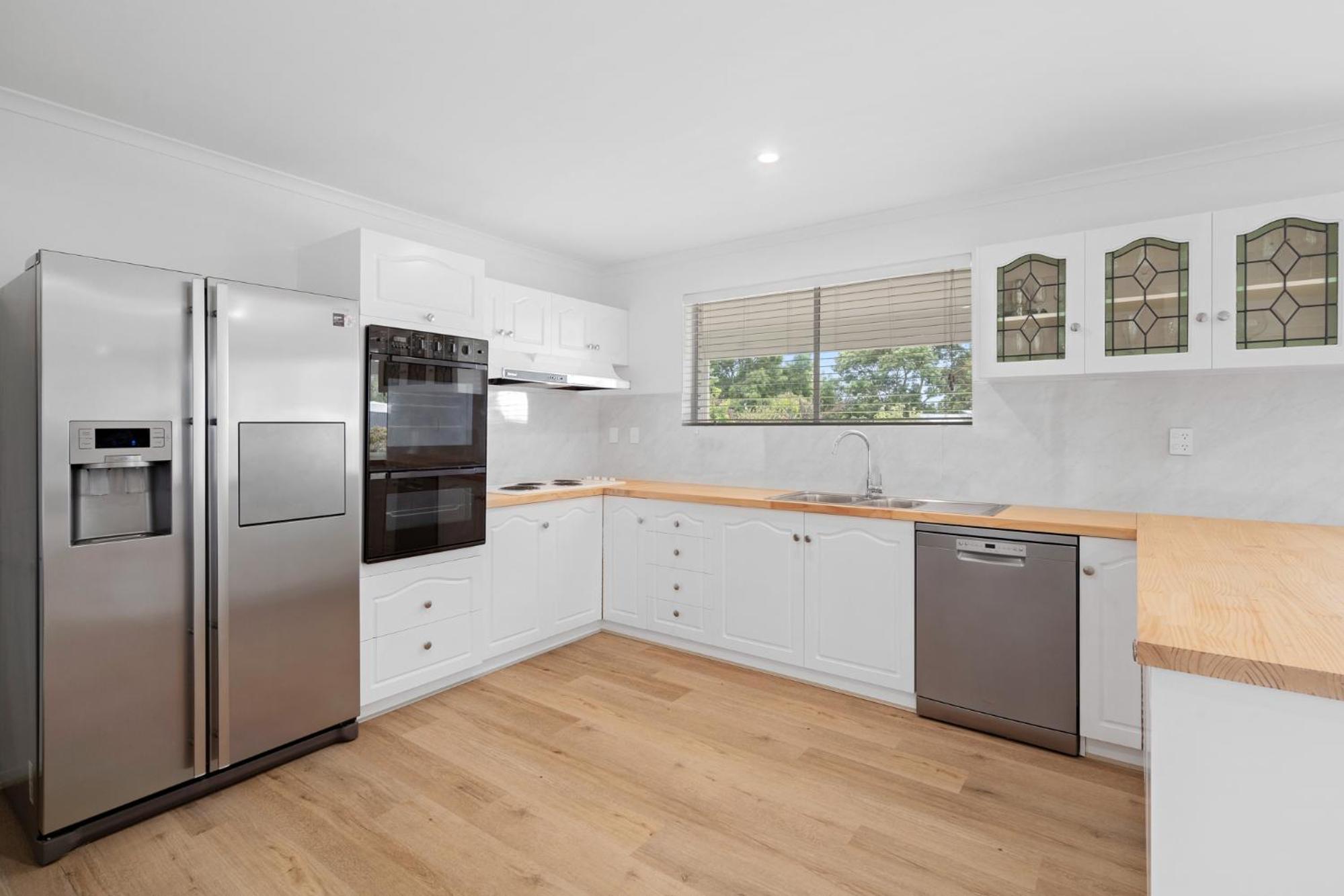 The Arches ~ Style, location and spacious living!
