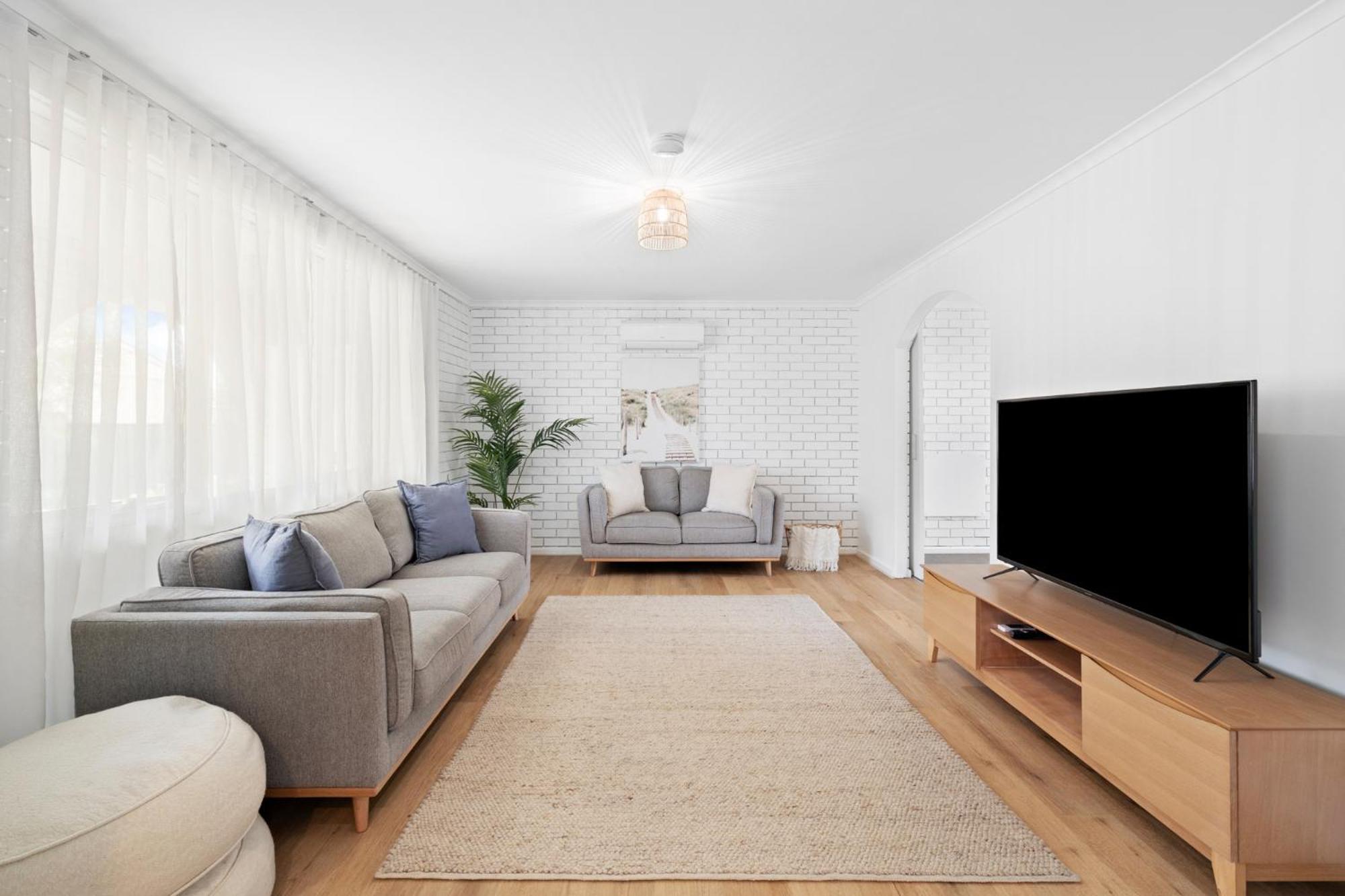The Arches ~ Style, location and spacious living!