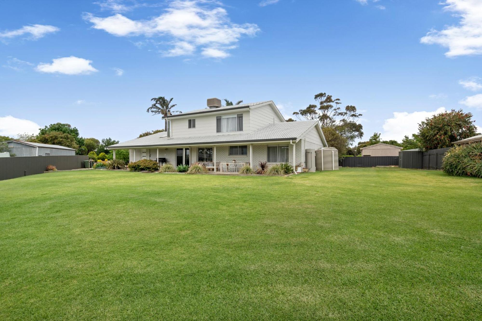 The Arches ~ Style, location and spacious living!
