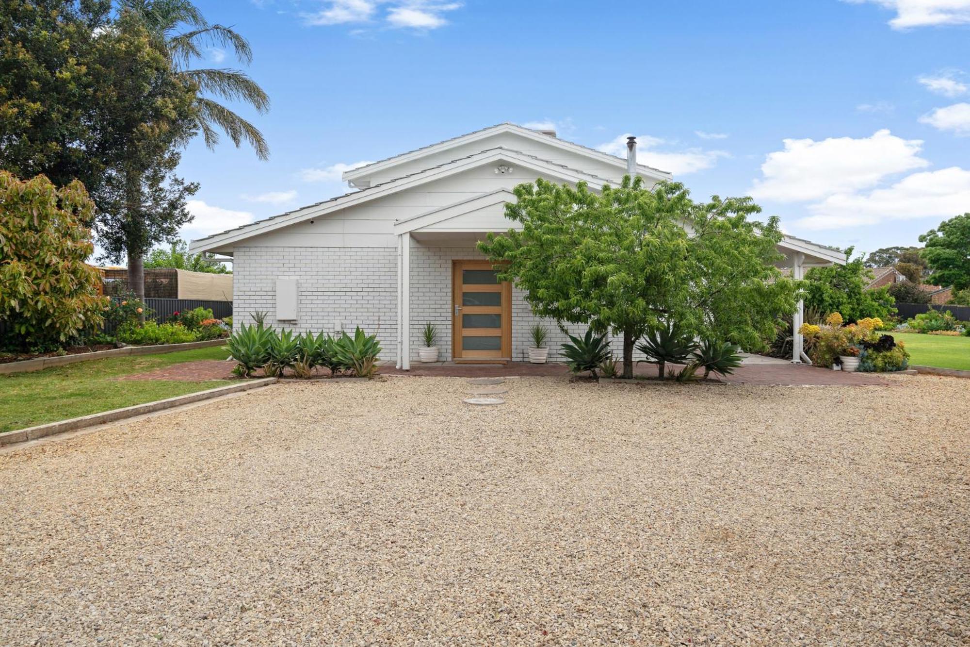 The Arches ~ Style, location and spacious living!