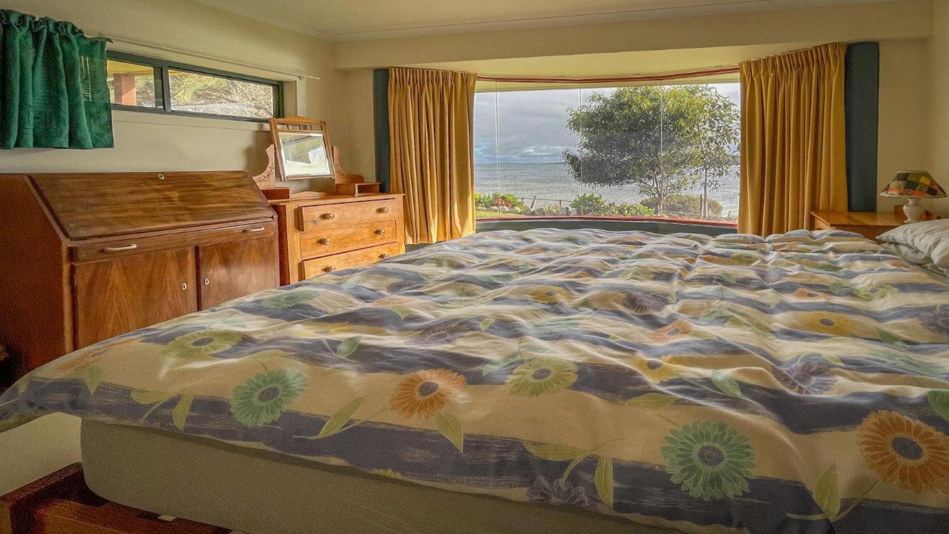 Sunset Ridge Has Direct Access To A Private Beach and Small Jetty