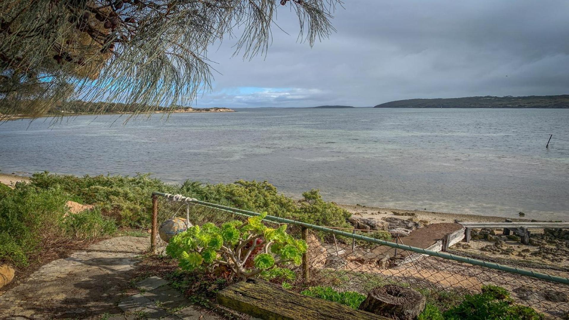 Sunset Ridge Has Direct Access To A Private Beach and Small Jetty