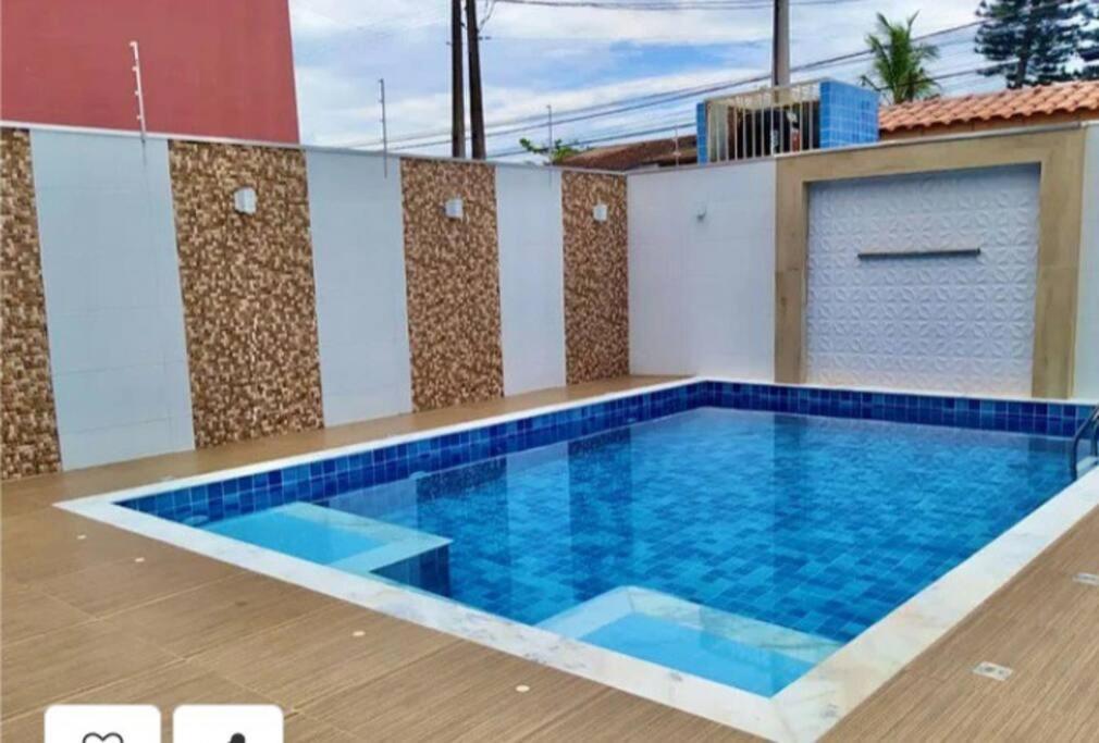 Casa alto padrão em Itanhaém, piscina com cascata, led e hidromassagem