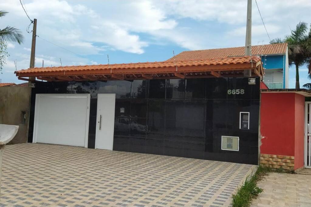 Casa alto padrão em Itanhaém, piscina com cascata, led e hidromassagem