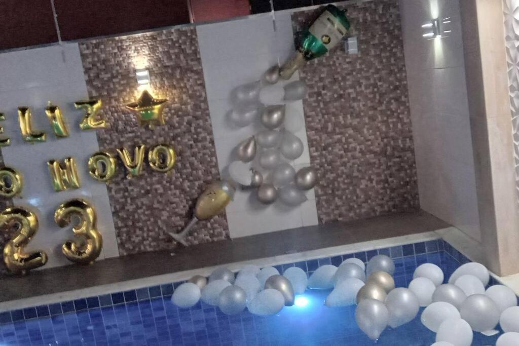 Casa alto padrão em Itanhaém, piscina com cascata, led e hidromassagem