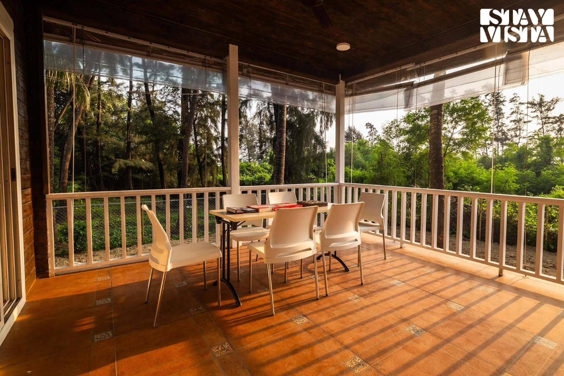 Serene Seaside Chalet by StayVista - Wooden retreat near Nagaon Beach