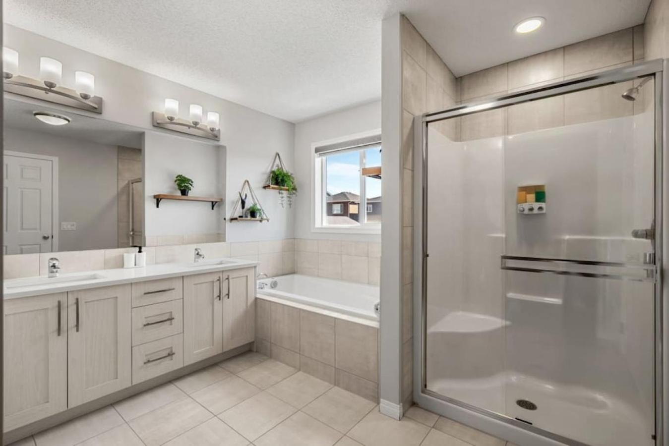 Top Rated Luxury House with Central AC, Double Garage Parking, 2 Kitchens, 5 Bedrooms & More!