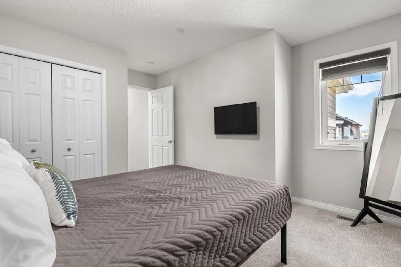 Top Rated Luxury House with Central AC, Double Garage Parking, 2 Kitchens, 5 Bedrooms & More!