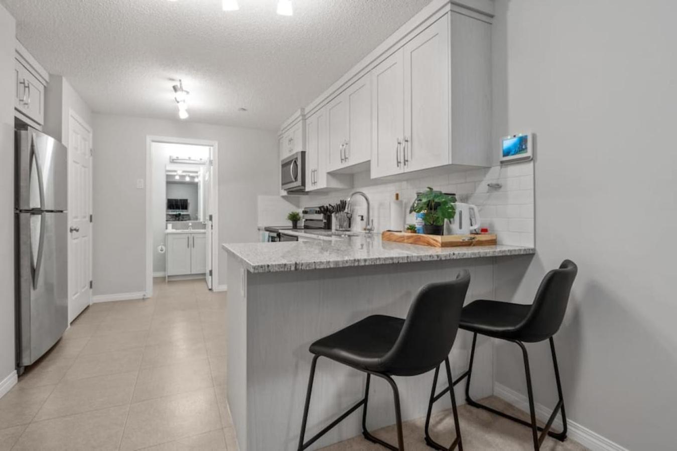 Top Rated Luxury House with Central AC, Double Garage Parking, 2 Kitchens, 5 Bedrooms & More!