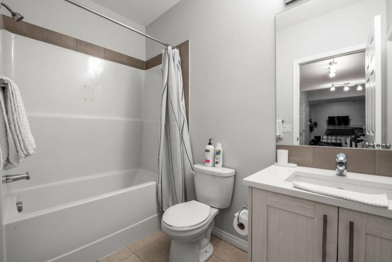 Top Rated Luxury House with Central AC, Double Garage Parking, 2 Kitchens, 5 Bedrooms & More!