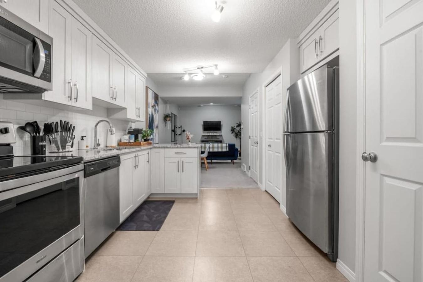 Top Rated Luxury House with Central AC, Double Garage Parking, 2 Kitchens, 5 Bedrooms & More!