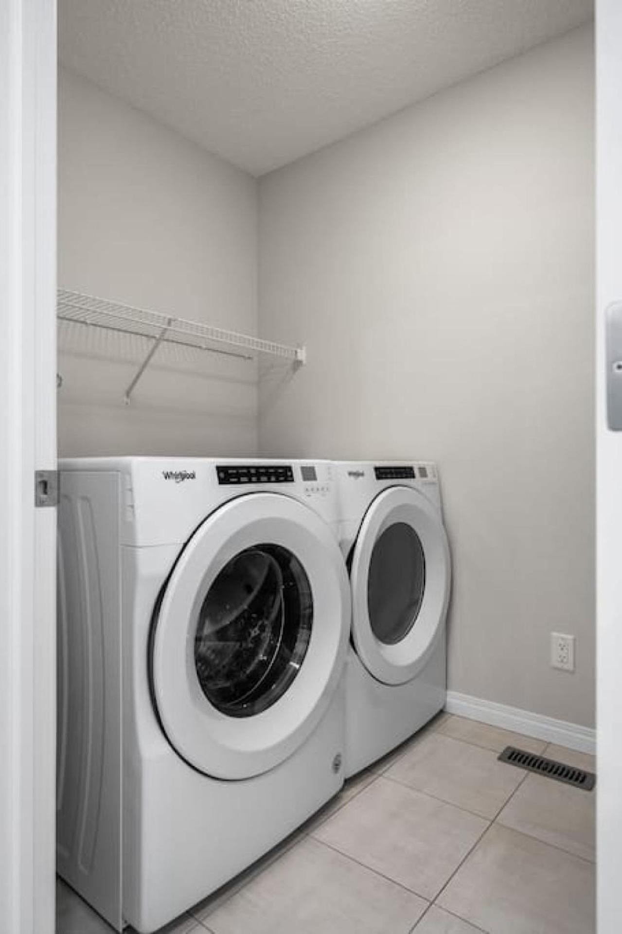 Top Rated Luxury House with Central AC, Double Garage Parking, 2 Kitchens, 5 Bedrooms & More!