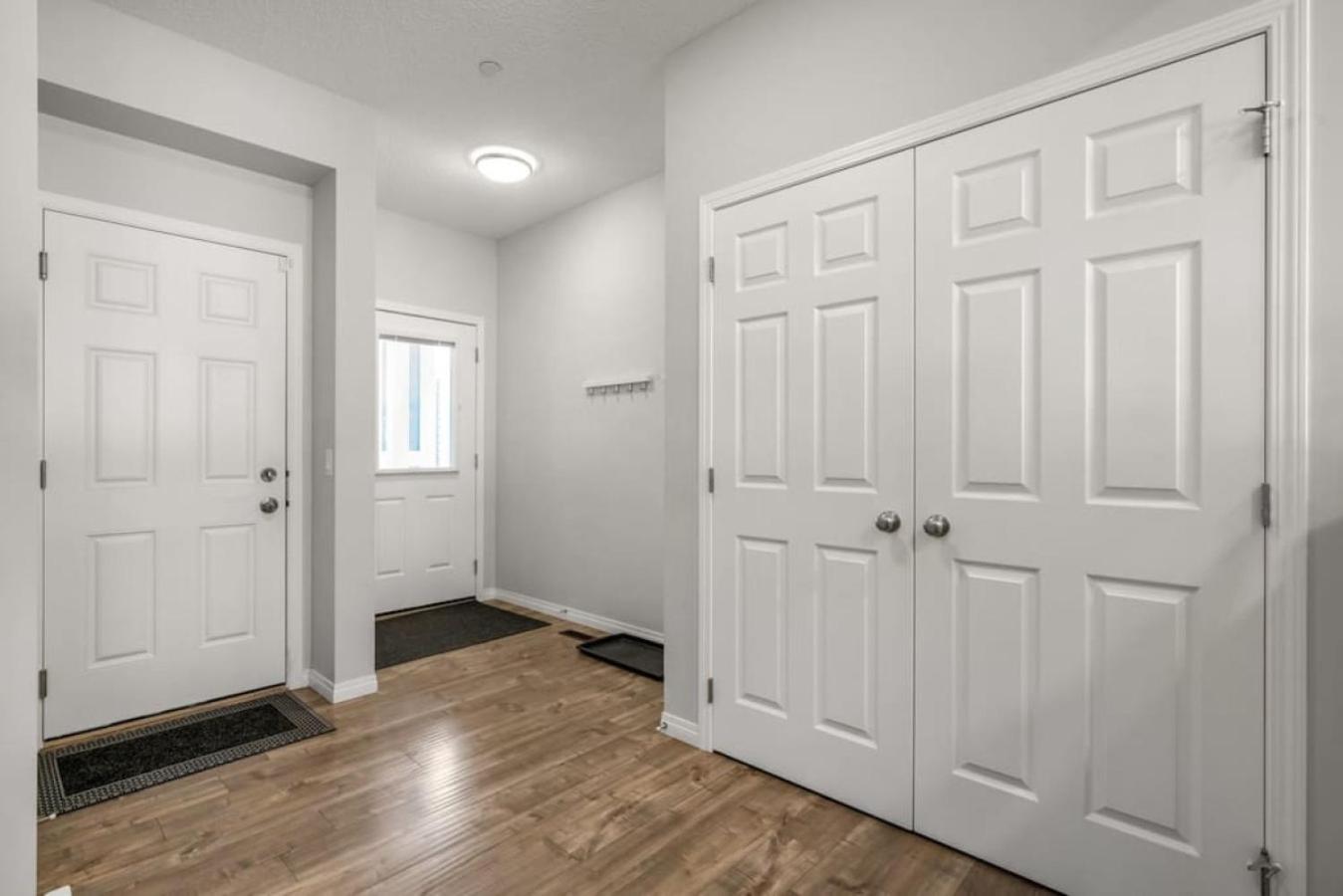 Top Rated Luxury House with Central AC, Double Garage Parking, 2 Kitchens, 5 Bedrooms & More!