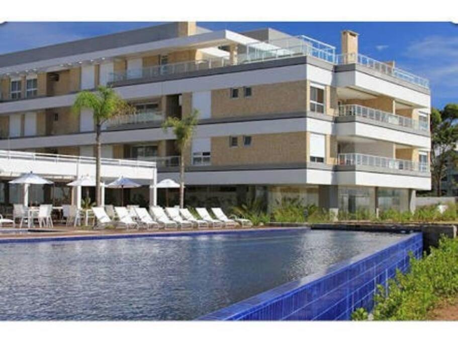 Apartamento acesso privado a praia