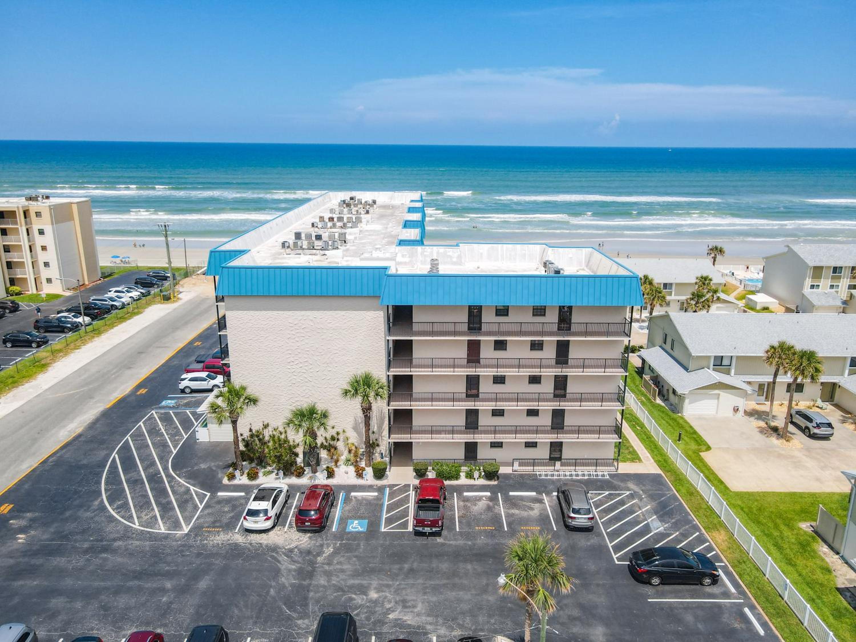 Lovely beachfront corner unit overlooking pool and clubhouse ~ HA501