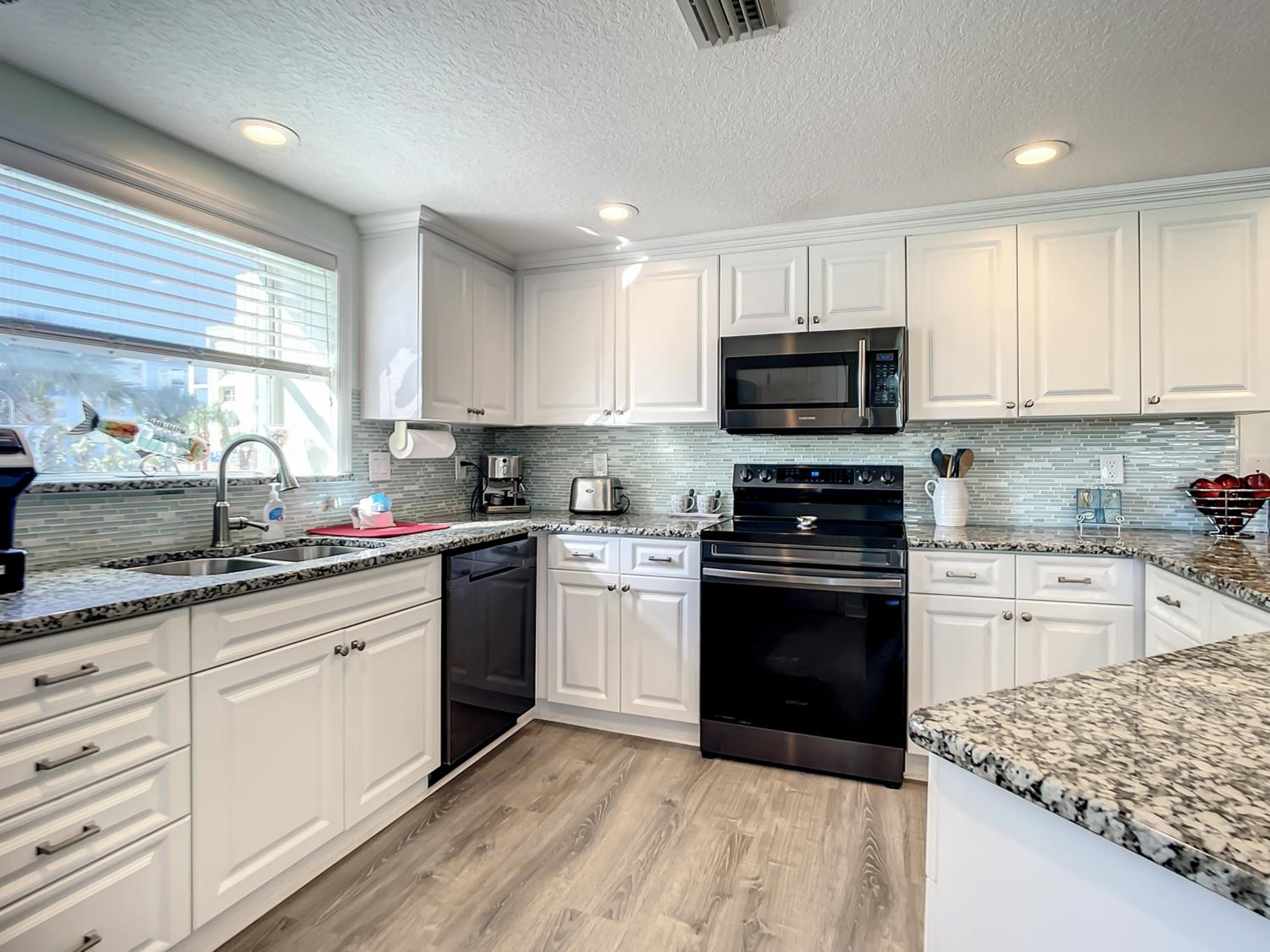 Gorgeous Oceanwalk Condo on the corner with superb views of the ocean. OW1-201