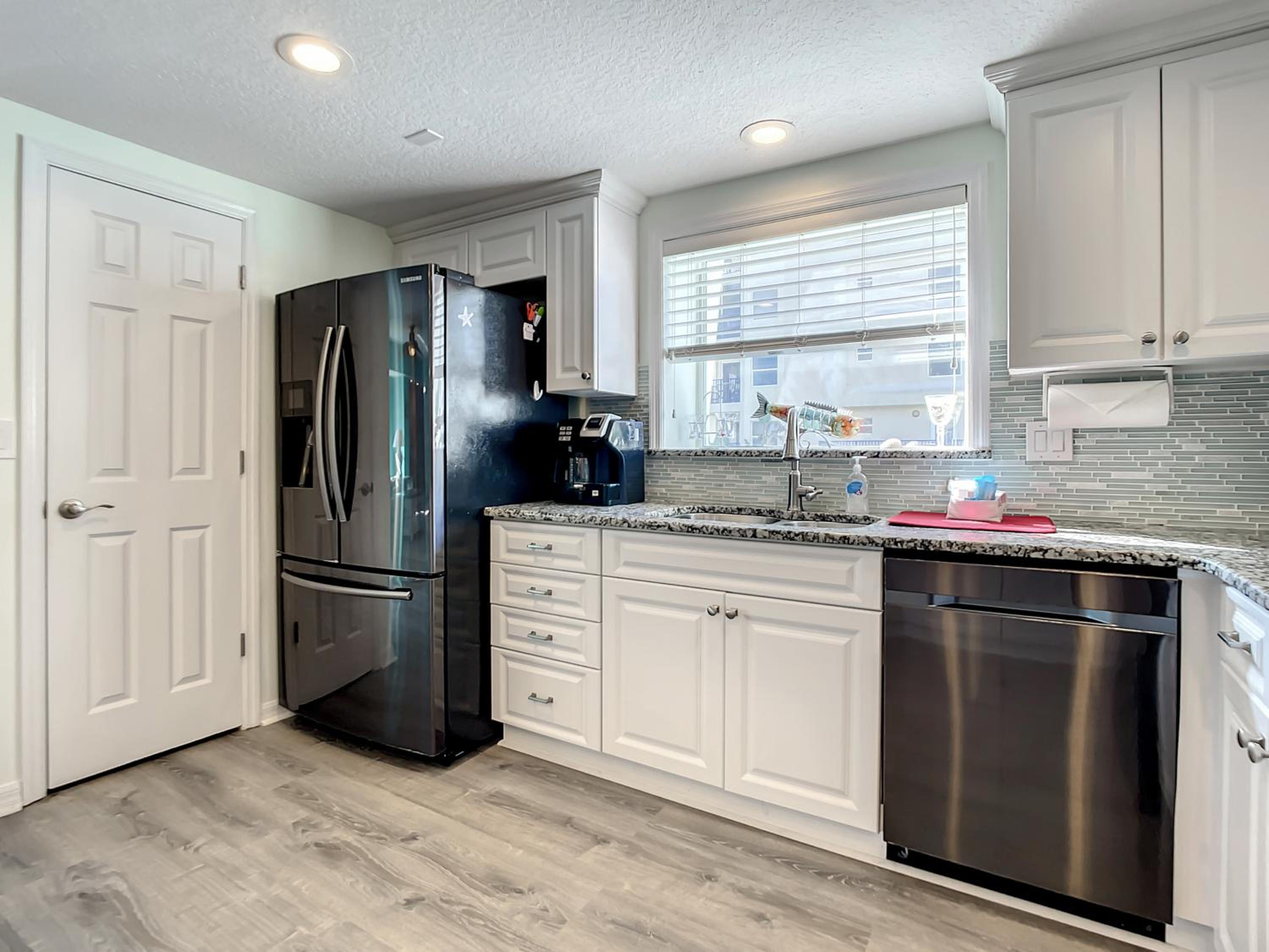 Gorgeous Oceanwalk Condo on the corner with superb views of the ocean. OW1-201