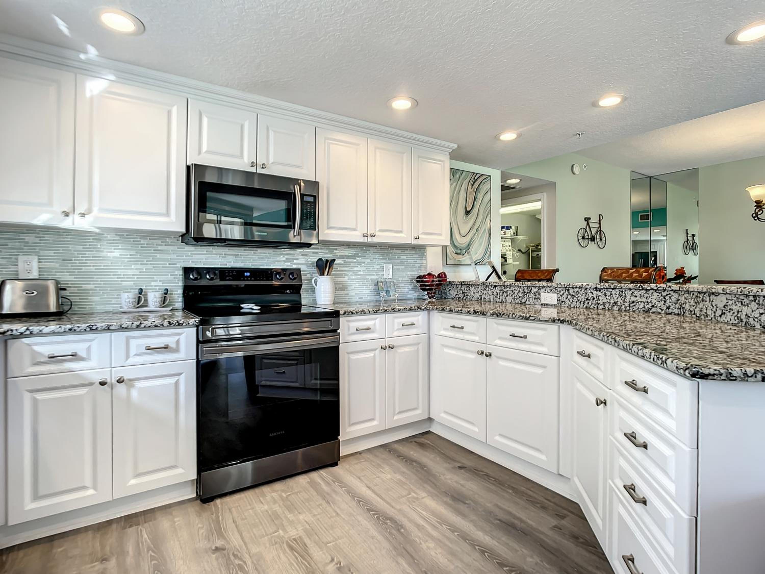 Gorgeous Oceanwalk Condo on the corner with superb views of the ocean. OW1-201