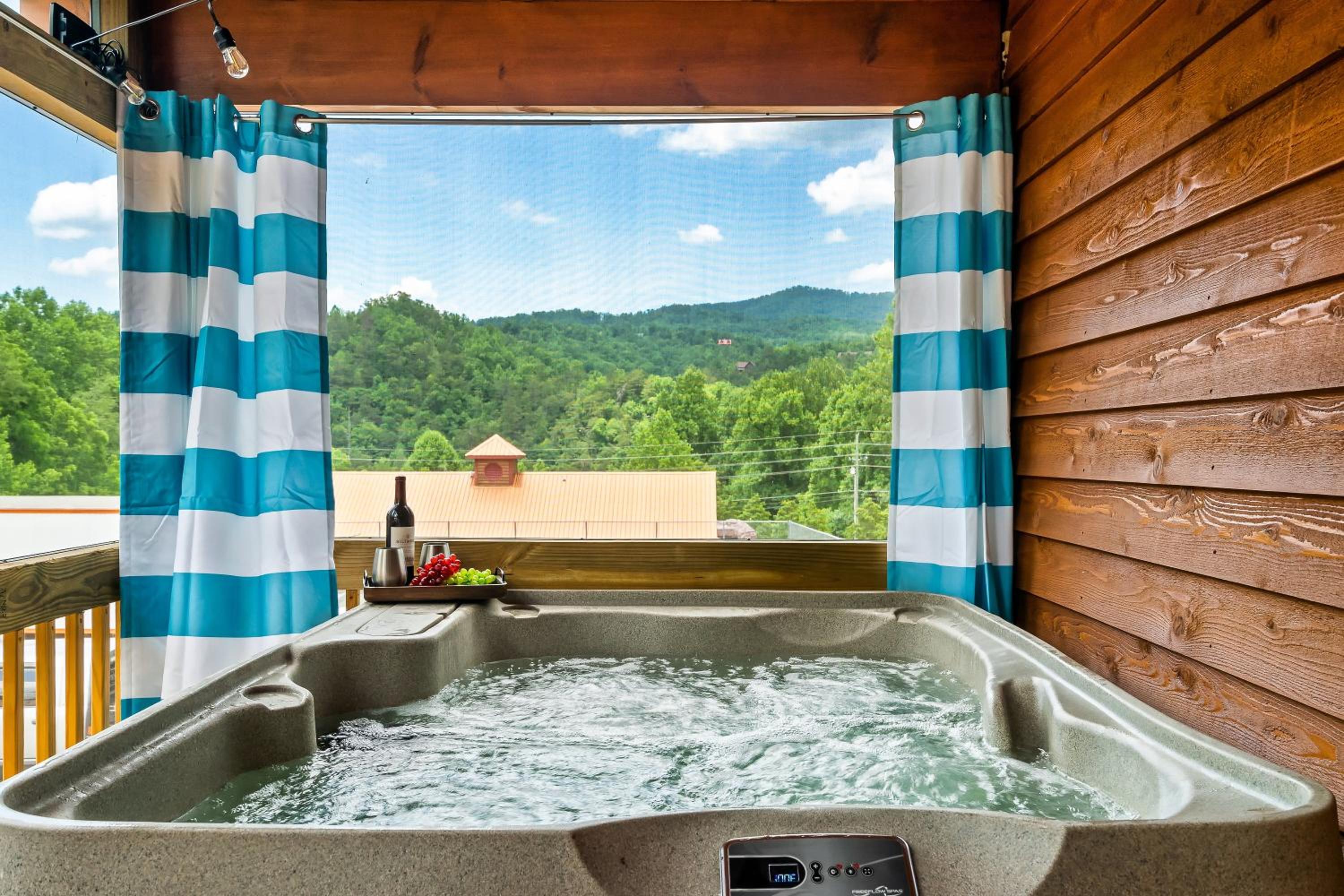 SmokiesBoutiqueCabins would love to host you at Dolly's Cute Cabin! 4 Suites with Private Bathrooms - Hot Tub, Fire Pit, Game Room, Resort Pool open Memori view 2