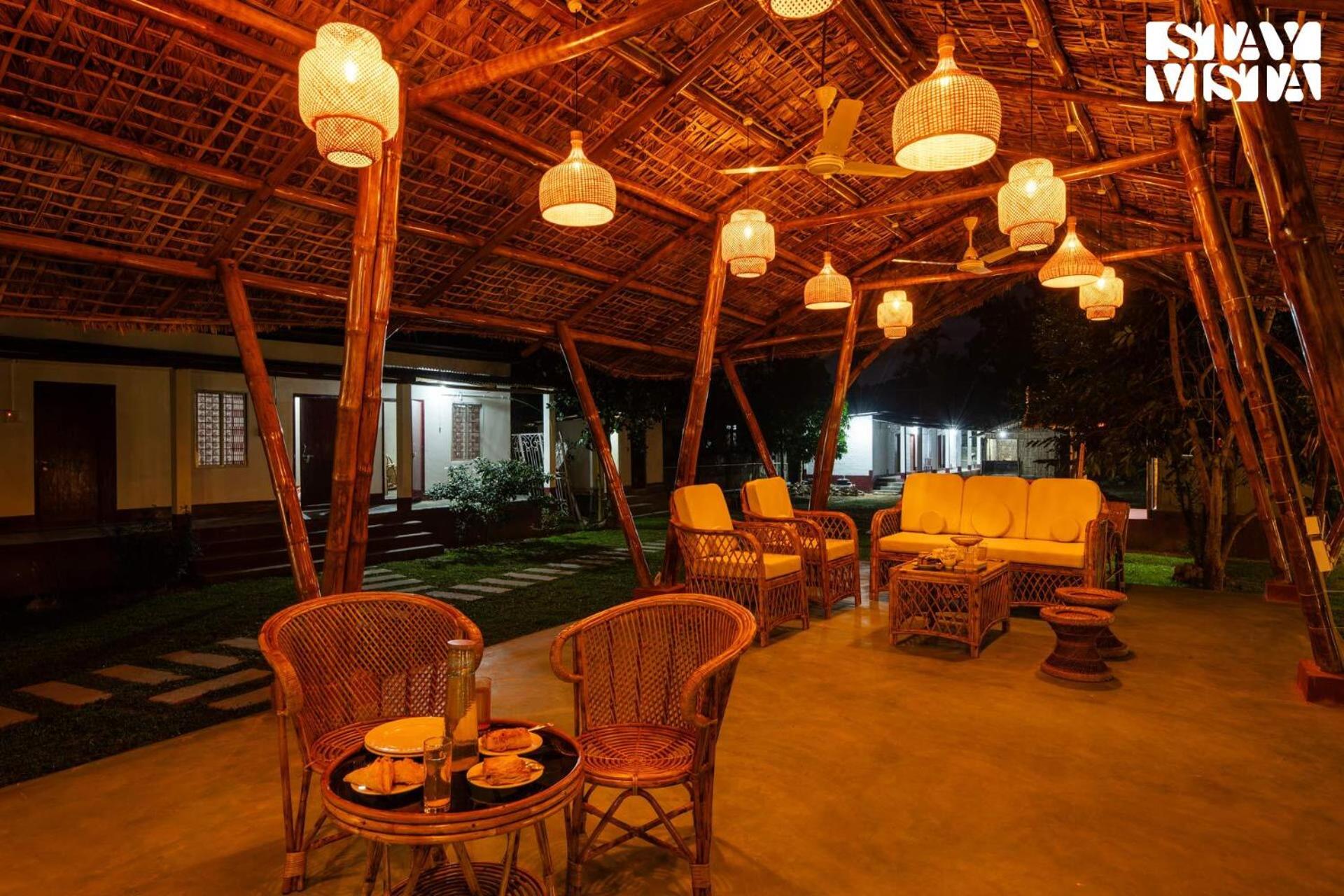 StayVista's Rupohi - Jorhat with Manicured Lawn & Gazebo view 4