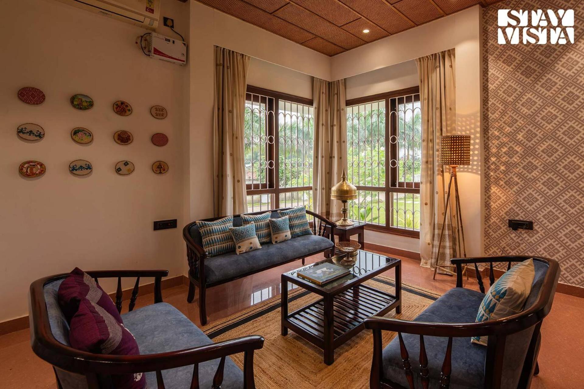 StayVista's Rupohi - Jorhat with Manicured Lawn & Gazebo view 5