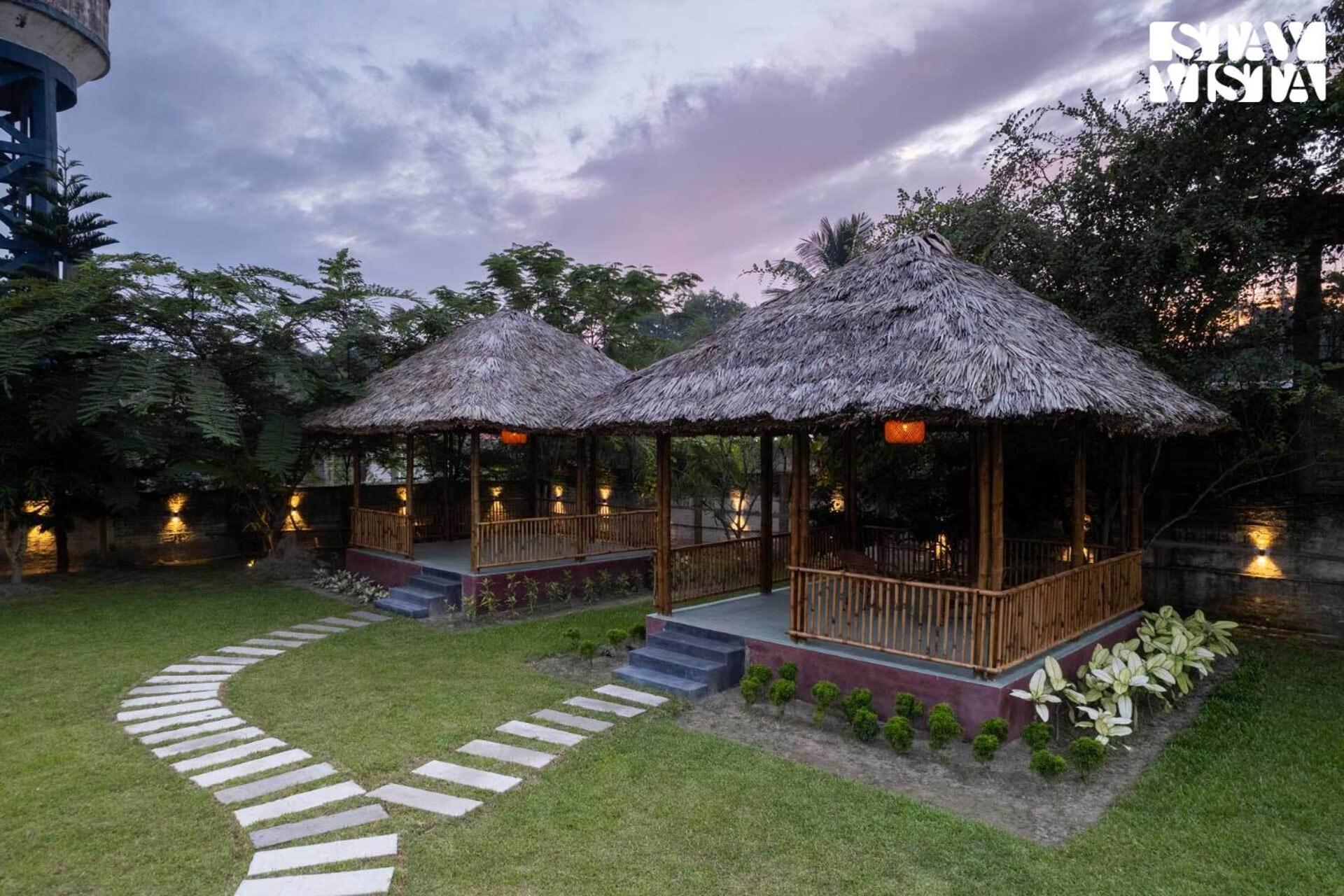 StayVista's Rupohi - Jorhat with Manicured Lawn & Gazebo view 3