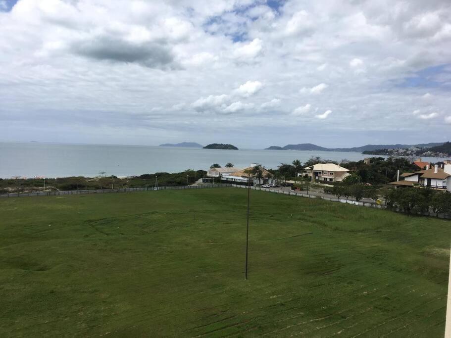 Il Campanário Jurerê vista frente mar andar alto