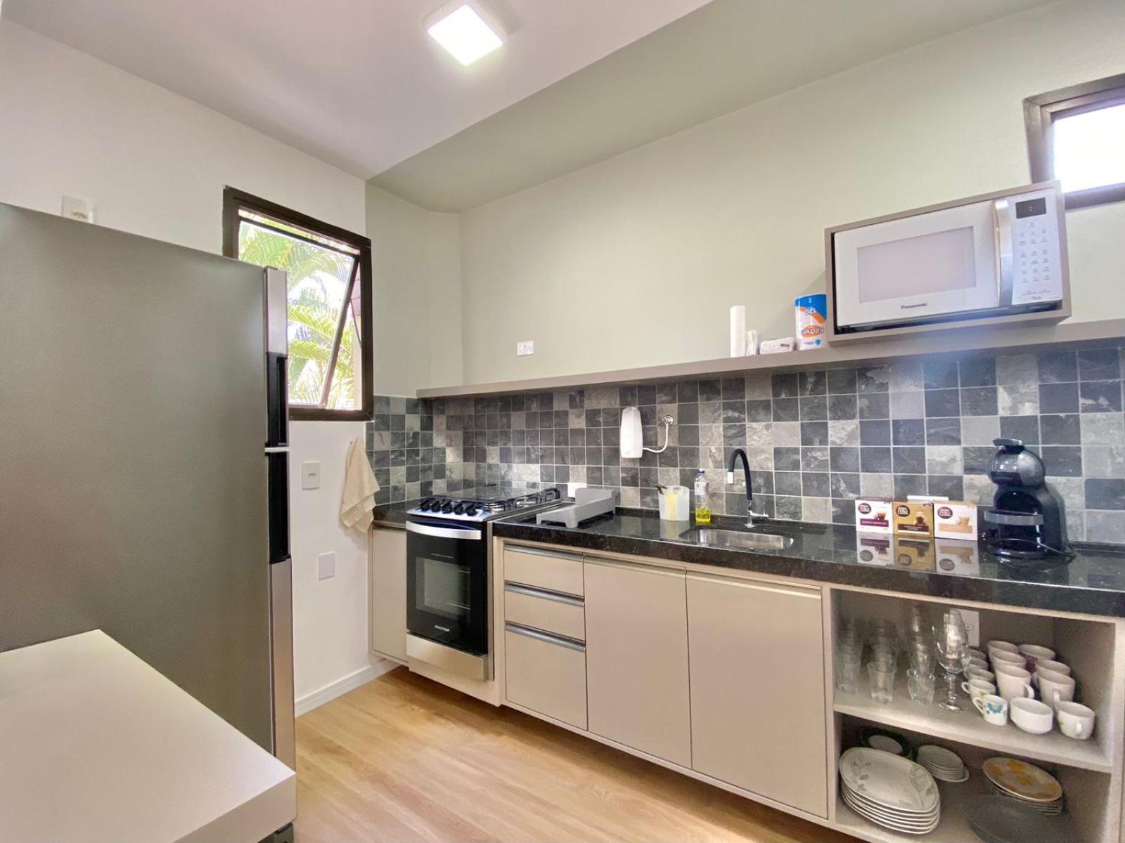 FLAT COM VARANDA E SERVIÇOS NO RIVIERA GREEN