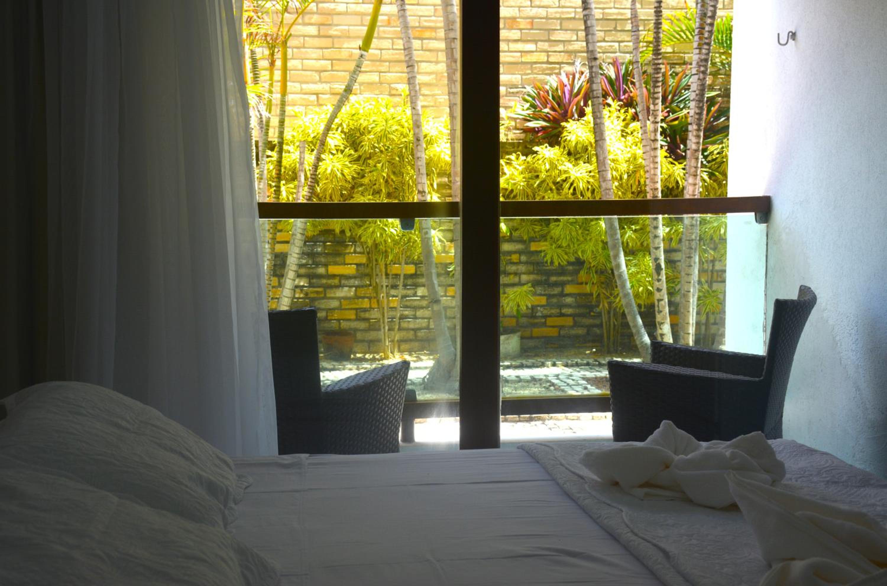 Araça flat 308 - Lateral Vista Jardim