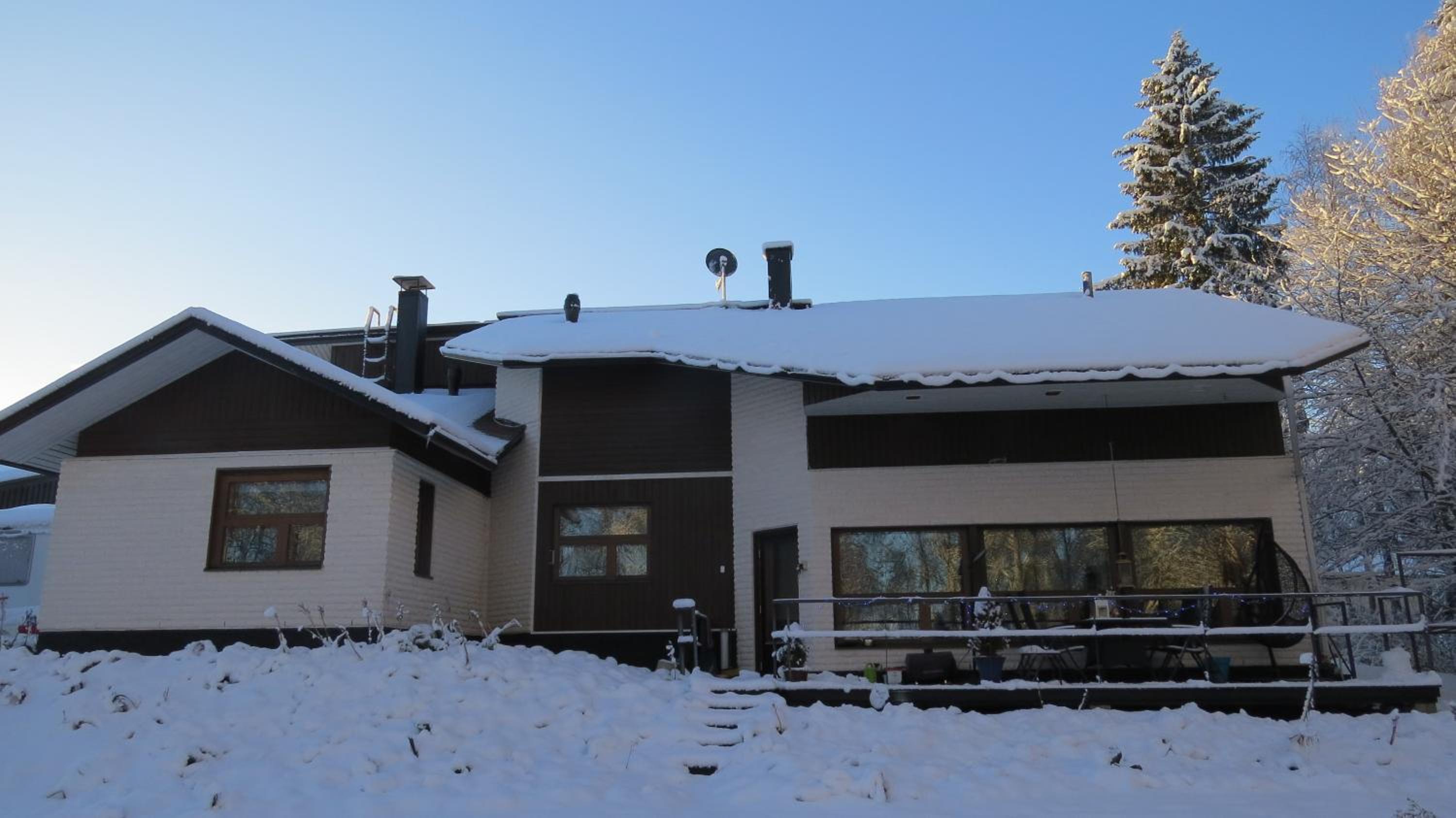 Atmospheric house on riverbank