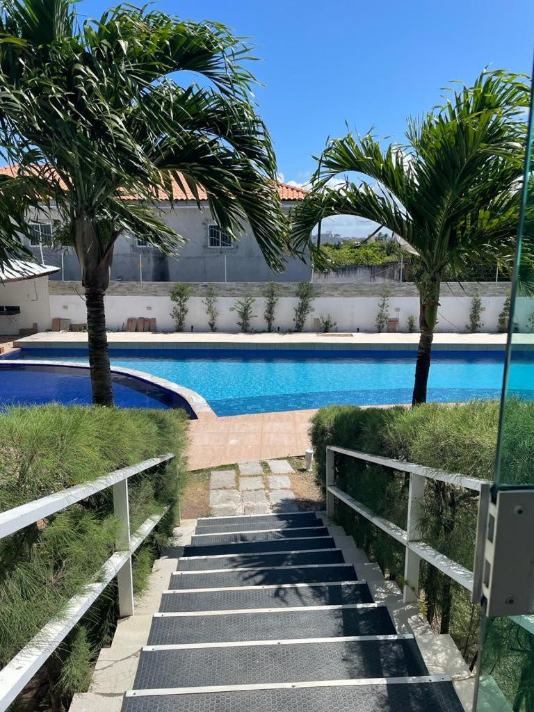 Mar e sol residencial 2 quartos com ar condicionado,500 metros da praia de Jacumã