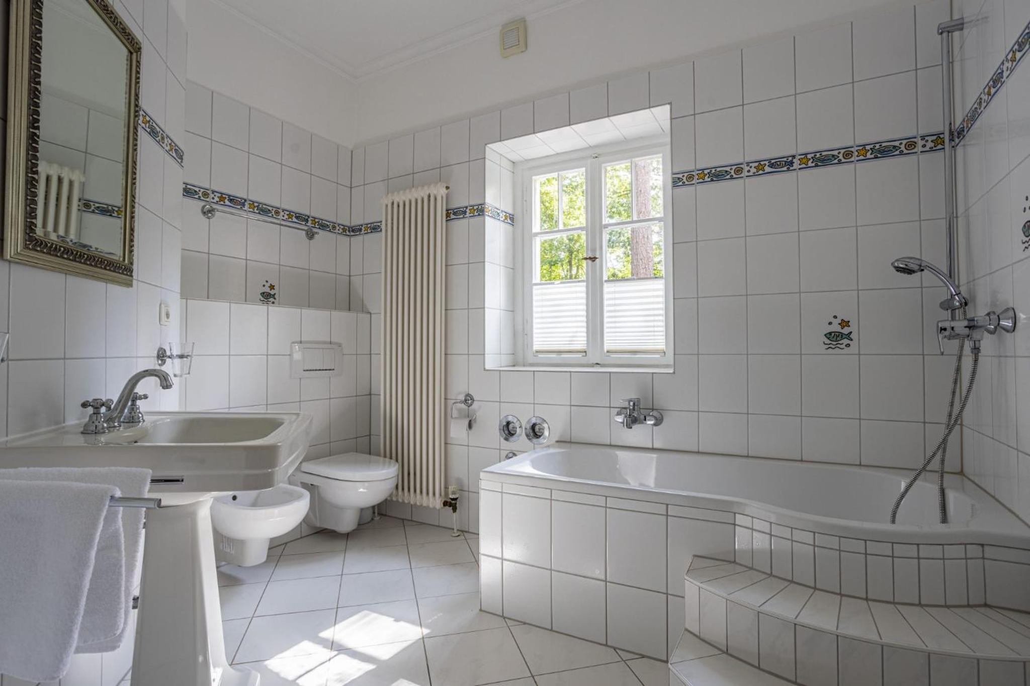 Strandvilla Hubertus Boltenhagen - Ferienwohnungen Apartment mit Parkplatz WLAN Küche Garten Grillplatz Waldbaden