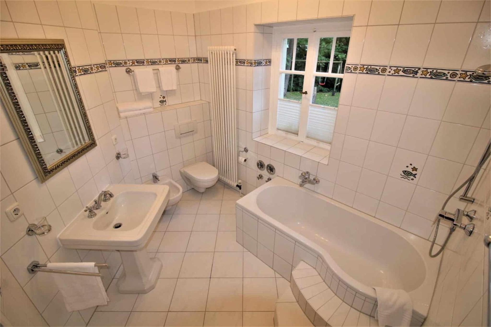 Strandvilla Hubertus Boltenhagen - Ferienwohnungen Apartment mit Parkplatz WLAN Küche Garten Grillplatz Waldbaden