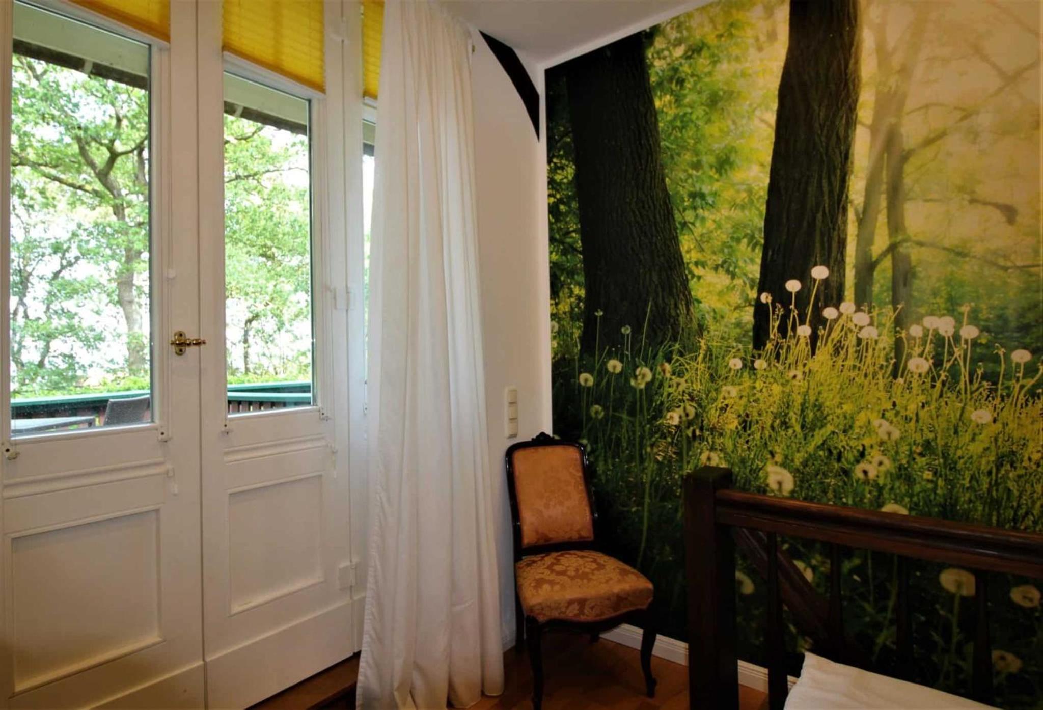 Strandvilla Hubertus Boltenhagen - Ferienwohnungen Apartment mit Parkplatz WLAN Küche Garten Grillplatz Waldbaden