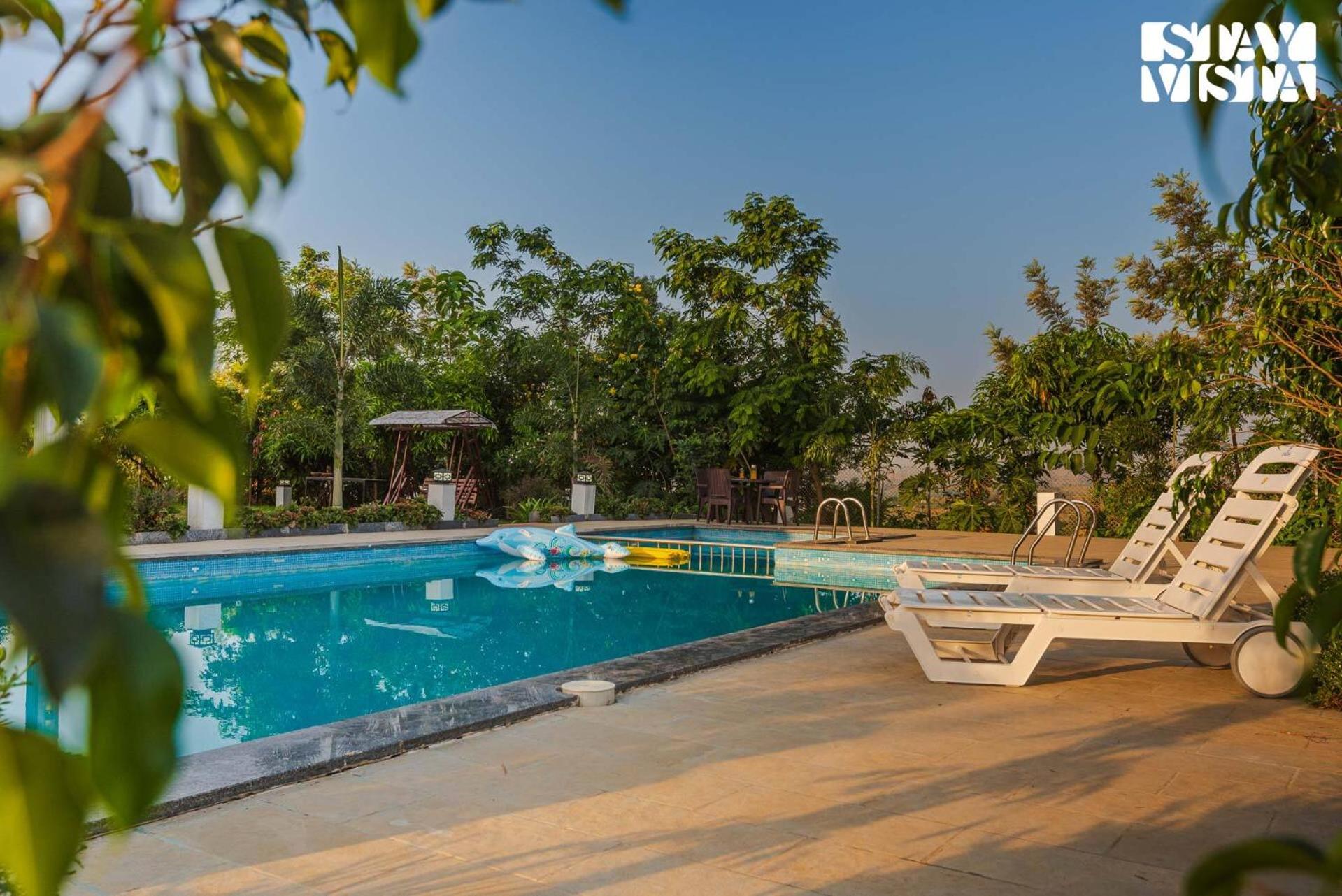 StayVista's Hill Crest Mansion - Hill-View Villa with Private Pool, Deck, Lawn & Gazebo view 5