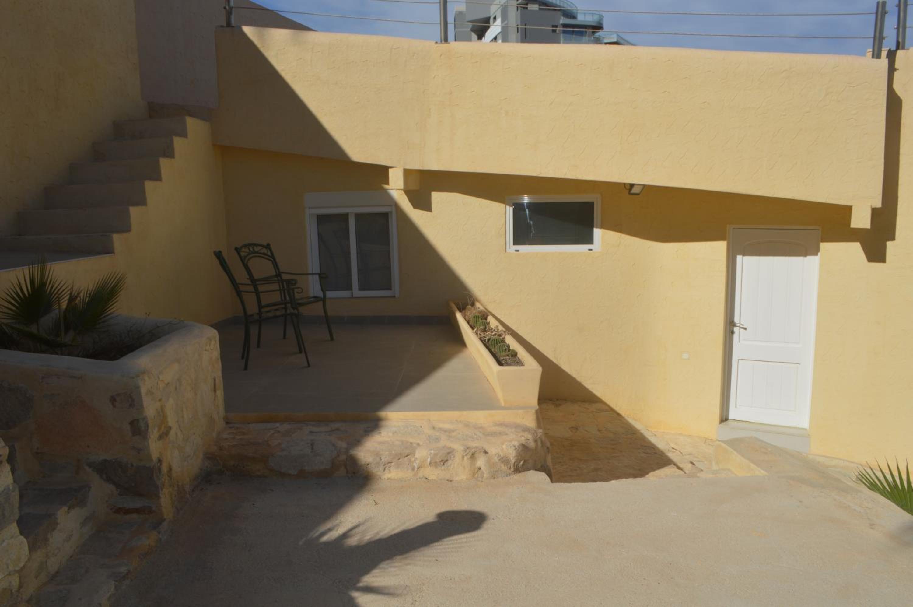 Espectacular Suite Privada a pie de playa y mar en CHALET ROQUETES