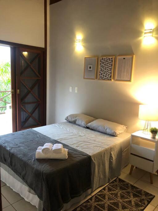 N12 Casa 3 dormitórios em condominio frente a praia
