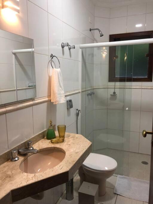 N12 Casa 3 dormitórios em condominio frente a praia