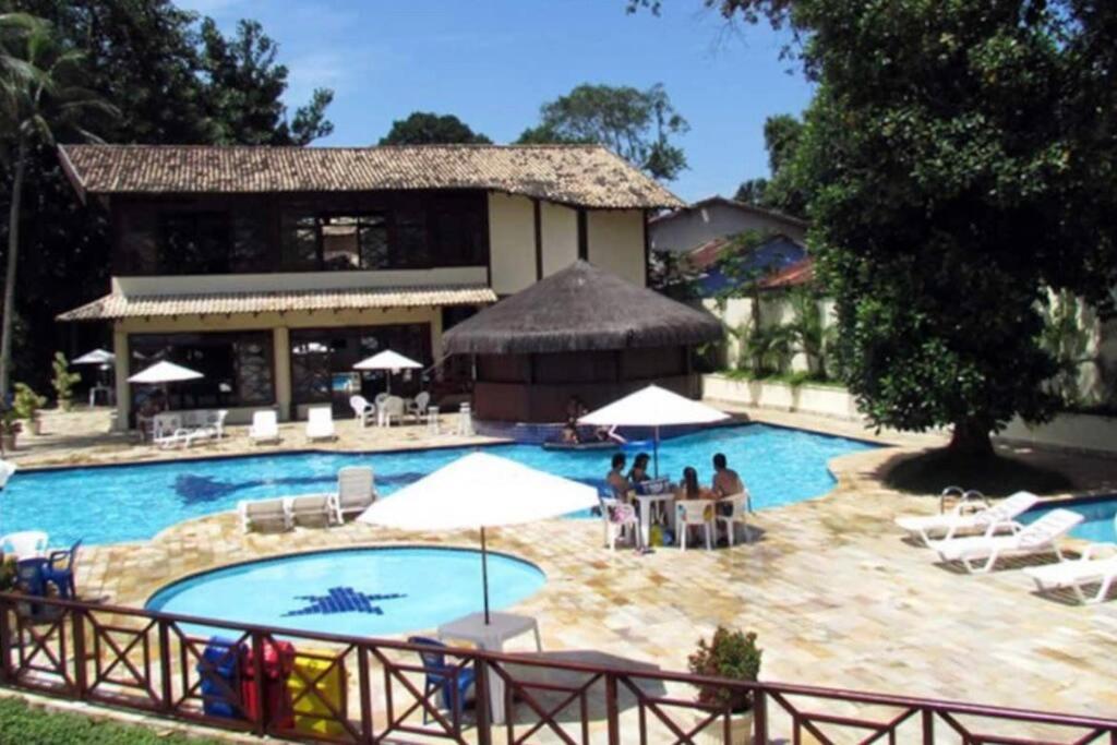 N12 Casa 3 dormitórios em condominio frente a praia