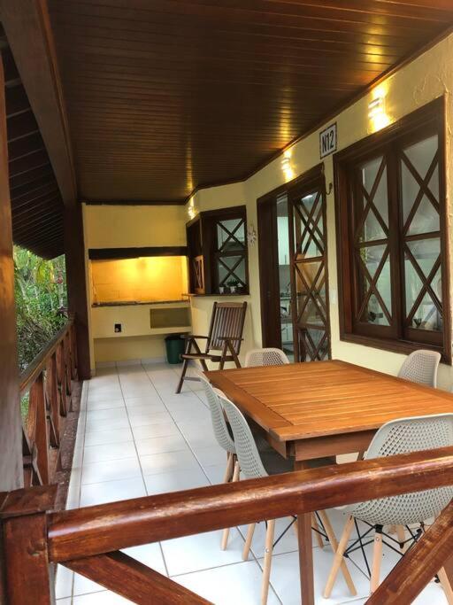 N12 Casa 3 dormitórios em condominio frente a praia