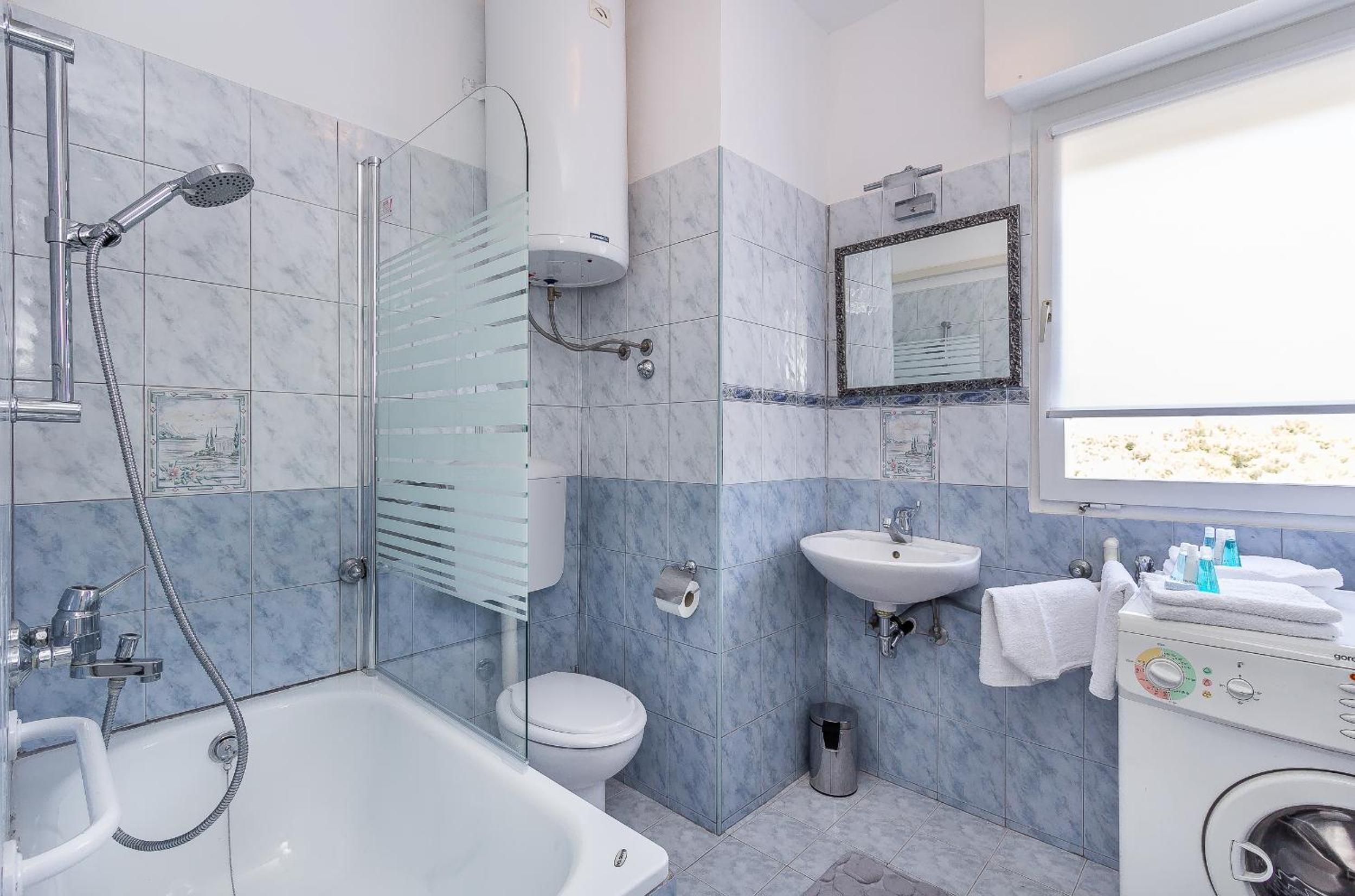 Romance Apartment en Pula — bathroom