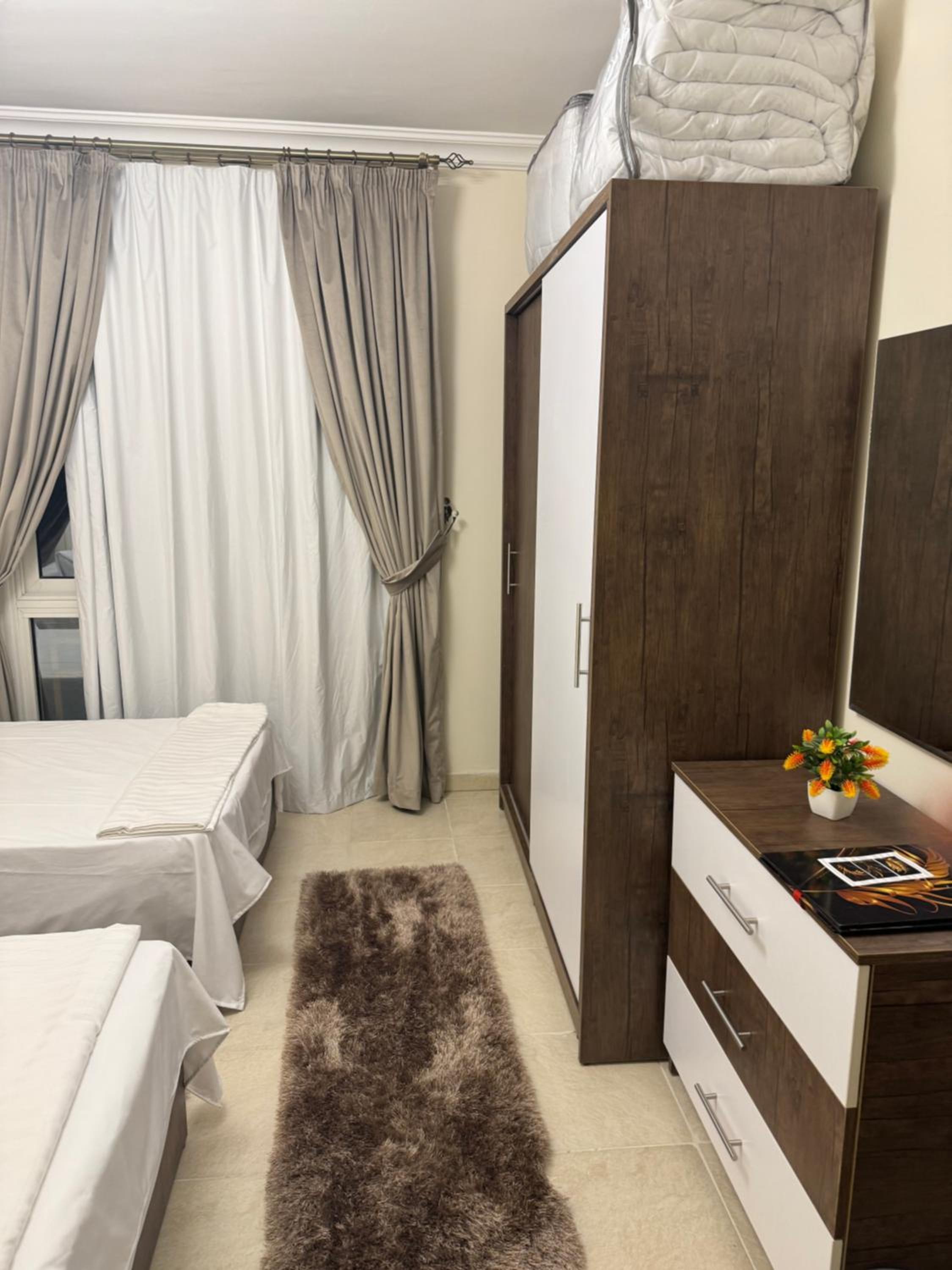 Two bedrooms in Madenity city Hotel apartment