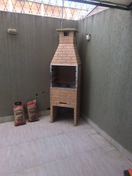 Apartamento em Condomínio Beverly Hills Praia de Vista Linda - Bertioga com Estacionamento e Piscina