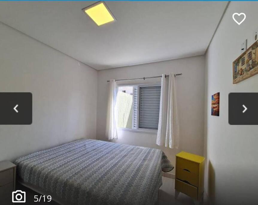 Apartamento em Condomínio Beverly Hills Praia de Vista Linda - Bertioga com Estacionamento e Piscina