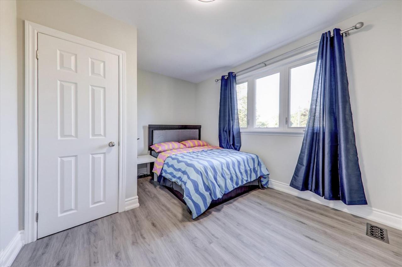 Stunning 7 Br RougeView Home with 2 Kitchens, 5 Bathrooms, Amazing Backyard & 8-Car Parking