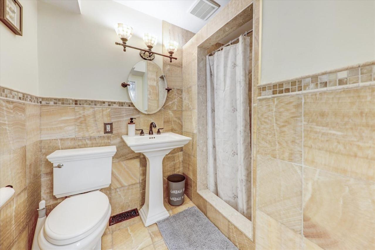 Stunning 7 Br RougeView Home with 2 Kitchens, 5 Bathrooms, Amazing Backyard & 8-Car Parking