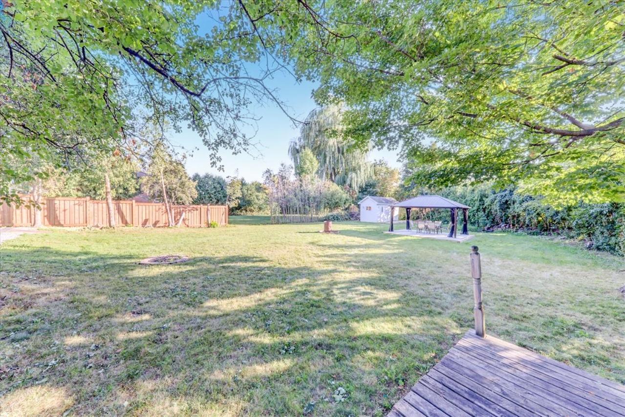 Stunning 7 Br RougeView Home with 2 Kitchens, 5 Bathrooms, Amazing Backyard & 8-Car Parking