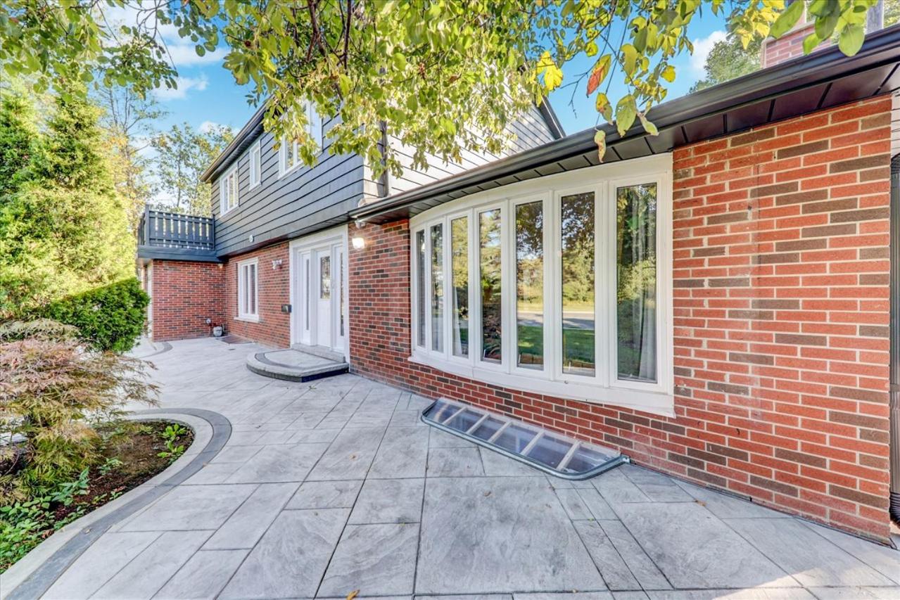 Stunning 7 Br RougeView Home with 2 Kitchens, 5 Bathrooms, Amazing Backyard & 8-Car Parking